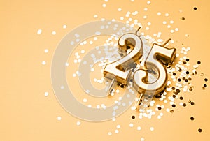 25 years birthday celebration festive background made with golden candle in the form of number Twenty five