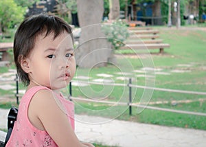2-3 years old baby Asian girl crying with worried expression looking to camera