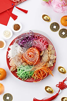 Yee Sang, Yusheng, Lo Hei, or Lou Sang is Cantonese Style Raw Fish Salad
