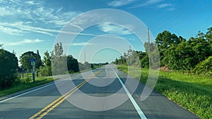 Yeehaw Junction, FL USA - July 16, 2023: A Time lapse video of Driving through the Florida countryside on Highway 441