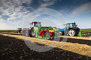 Yekaterinburg, RUSSIA - August 23, 2018: Agricultural machinery in a potato field