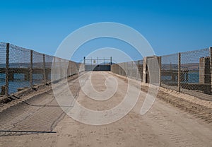 YELLAND, NORTH DEVON, UK - JUNE 2 2020: View along the jetty related to the former power station on the site which is