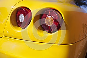 Yelllow sports car spot lights