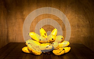 Yello banana still life on wooden background