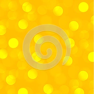 Yellow abstract blurred background with bokeh effect