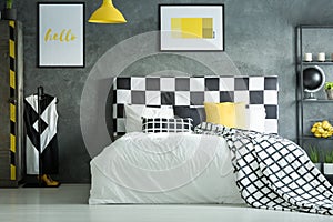 Yellow accent in dark bedroom