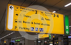 Yellow airport information sign