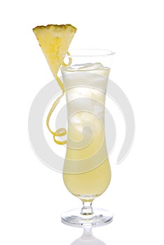 Yellow alcohol cocktail with pineapple