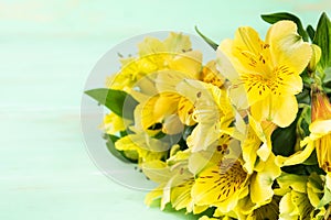 Yellow Alstroemeria on wooden background