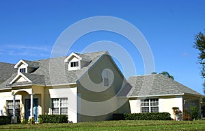 Yellow American dream home with garage