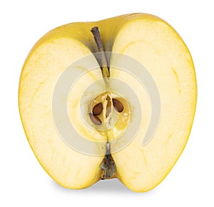 Yellow apple cut in half