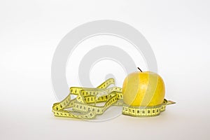 Yellow apple and the ruler