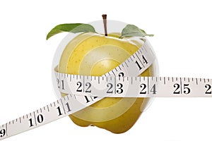 Yellow Apple and Tape Measure