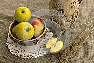 Yellow apples and ceramic foodware