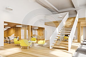 Yellow armchairs waiting room in open space office