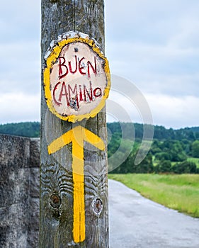 Yellow arrow, sign for pilgrims on the Camino de Santiago in Spa