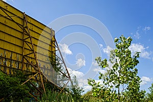 Yellow back of a screen drive inn CinÃÂ©-Parc Laval screen closed down in 2004 photo