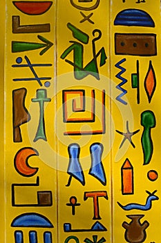 Yellow background with ancient Egyptian drawings photo