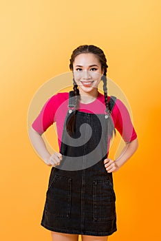 On a yellow background, Asian girl`s various expressions display, embodies the charm of asian girls