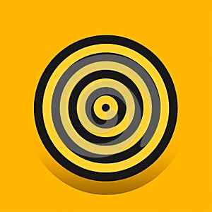 a yellow background with a black and white target in the center