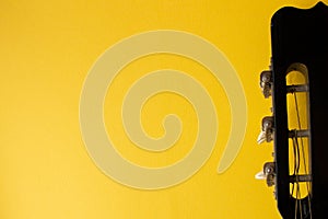 Yellow background. Guitar. Guitar strings, neck. Poster