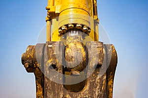 yellow backhoe loader on construction site and work