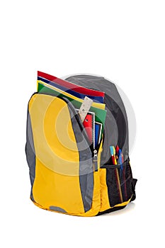 Yellow backpack with school supplies