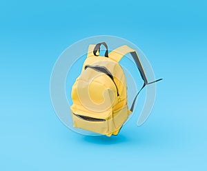 Yellow Backpack Suspended in Air on Blue Background