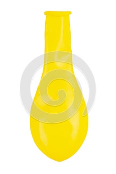 Yellow balloon without air. New colorful balloon isolated on white background. Object for birthday party decor