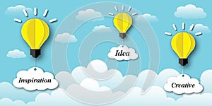 Yellow balloon light bulb with white cloud on blue sky background. Ideas inspiration concepts of business.