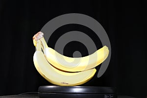 Yellow banana bunch showcased for front covers of magazines and billboards!