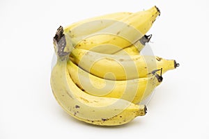 Yellow banana comb ready to eat isolated on white background