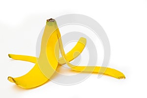 Yellow banana peel isolated on white