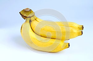 Yellow bananas on the white background