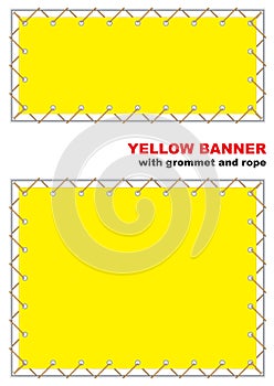 Yellow banner with grommet and rope. photo