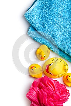 Yellow bath ducks and bath puff