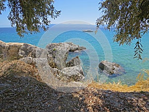 Yellow beach sand and beautiful blue sea. Natural living. Pelion peninsula. Pagasetic gulf. Platanias village. Greece.