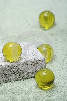 Yellow beads of bath oil