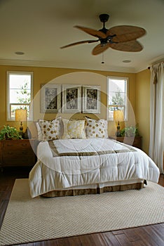 Yellow Bed Room with Fan