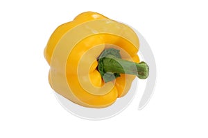 Yellow bell pepper, a staple food ingredient, on white background