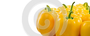 Yellow bell peppers isolated on white background, vegan, vegetable border. Fresh sweet organic bell pepper close up