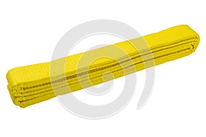 Yellow belt for a sports kimono, the belt is folded, on a white background