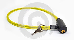Yellow bicycle lock for bike with key isolated on white background