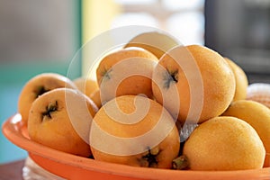 Yellow and big loquats on the plate