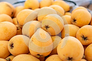 Yellow and big loquats on the plate