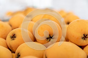 Yellow and big loquats on the plate