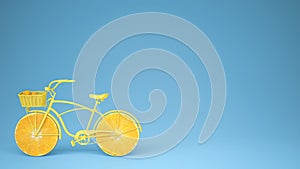 Yellow bike with sliced orange wheels, healthy lifestyle concept with blue pastel background copy space