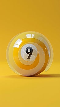 A yellow billiard ball with the number 9 on it rests on a yellow background