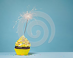 Yellow Birthday Cupcake with fun sparkler photo
