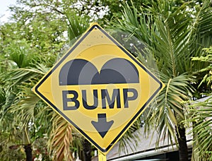 Yellow and Black Bump Caution Road Sign